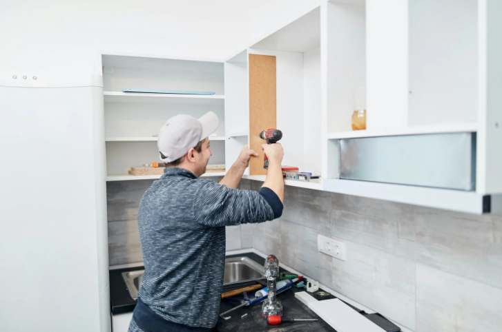 Kitchen cabinet installation during a remodeling project